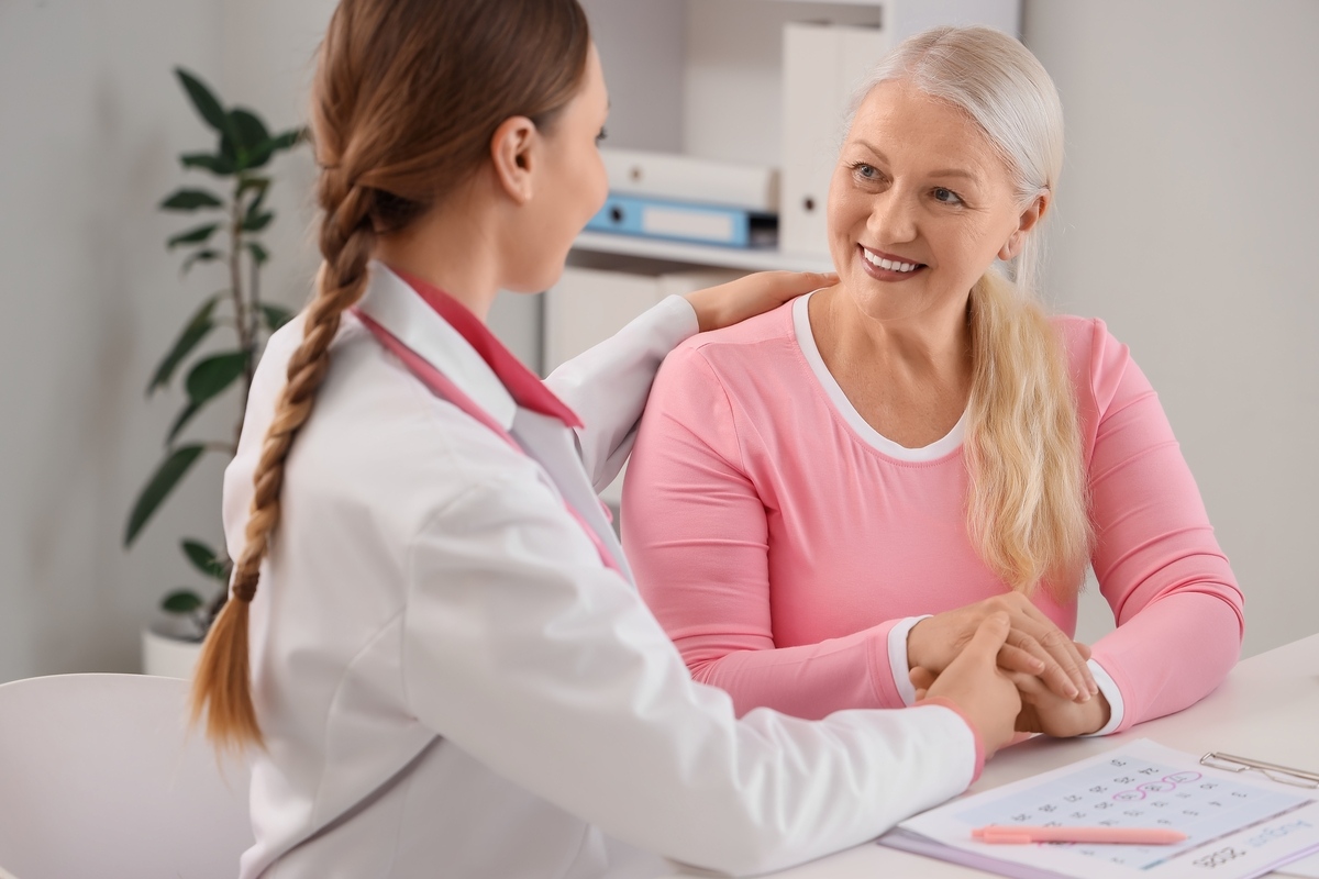 Provider comforting a patient during an HRT in Brunswick, OH consultation
