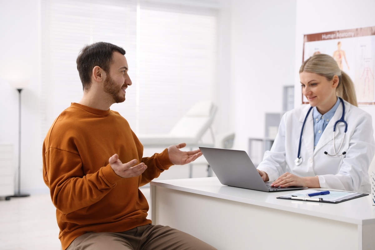 Provider discussing TRT in Brunswick OH with a male patient during a consultation